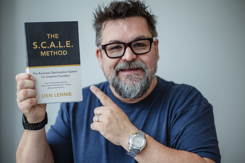 Den Lennie holding The S.C.A.L.E. Method book